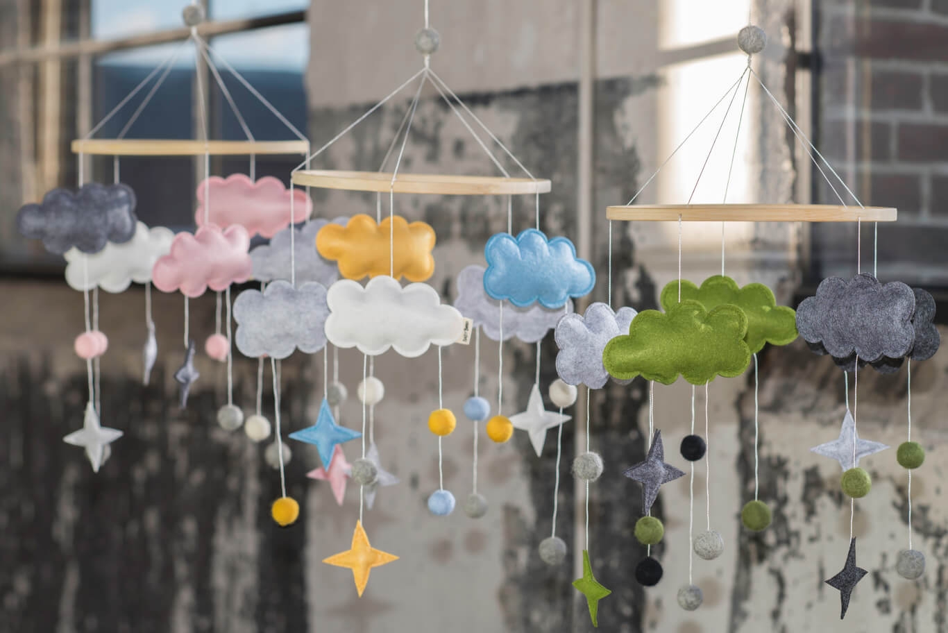 Baby Bello Filz-Mobile Fantasy Clouds grün